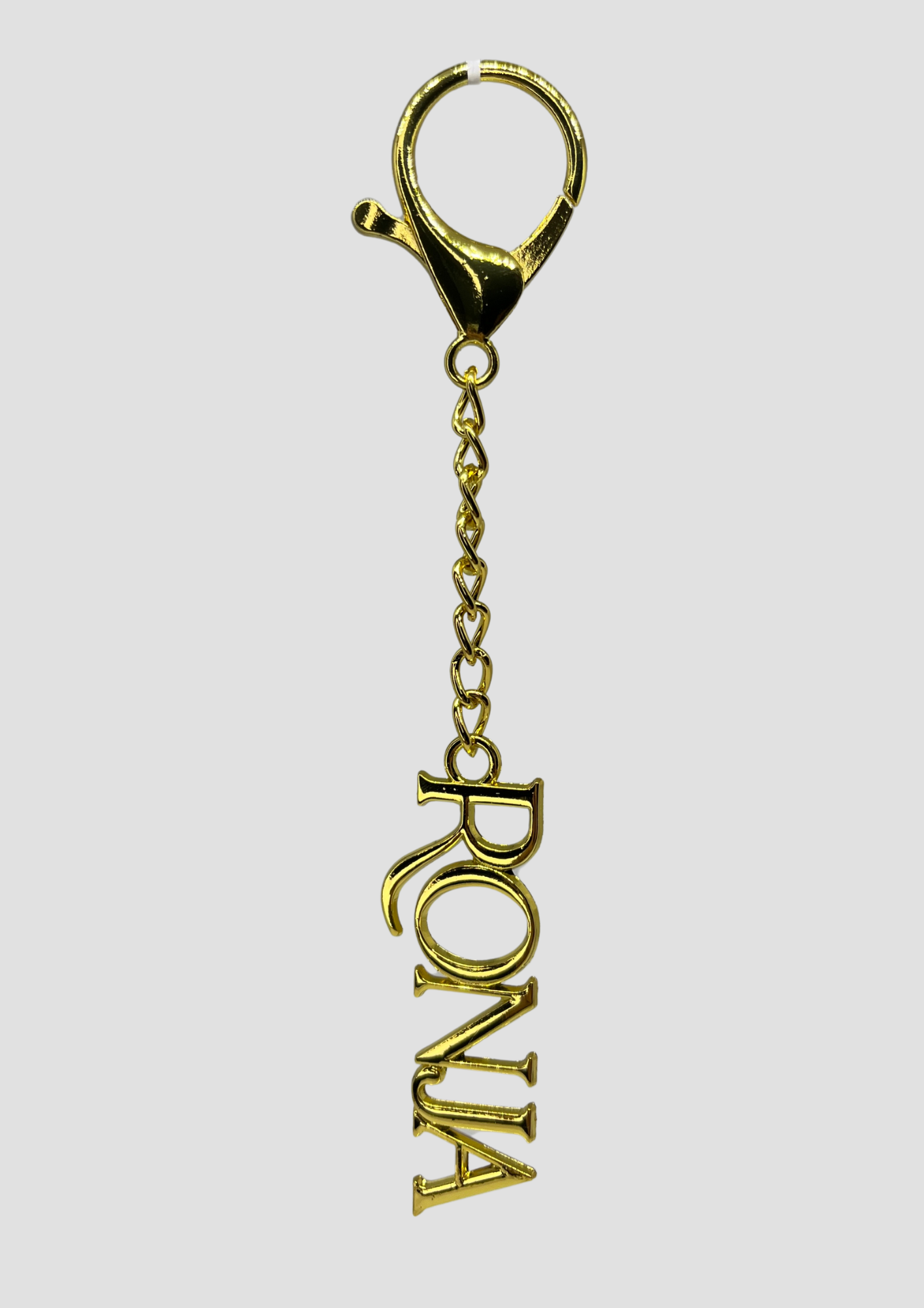 Ronja Studio logo charm in silver – essential base piece for building your custom bag charm