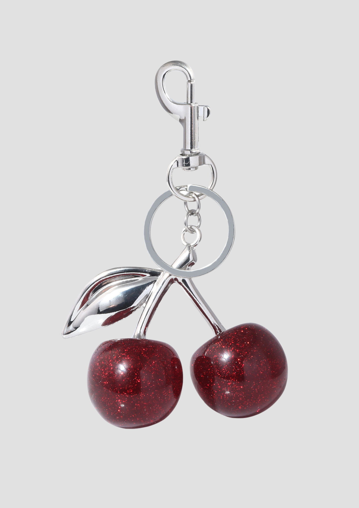 Cherry bag charm – silver and red cherry charm from Ronja Studio for a sweet, stylish look