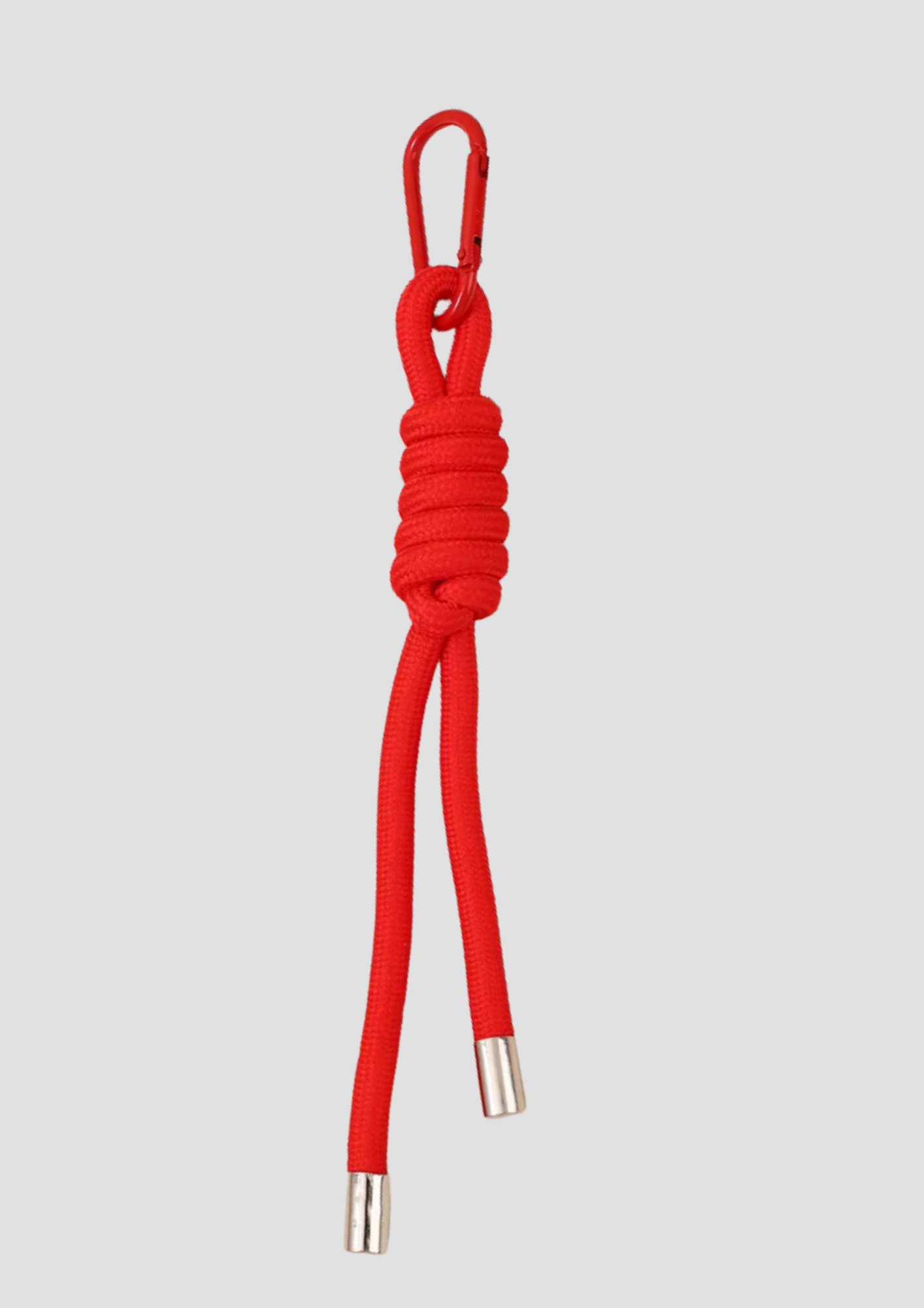 Rope charm – red rope-style bag charm from Ronja Studio, adds structure and contrast