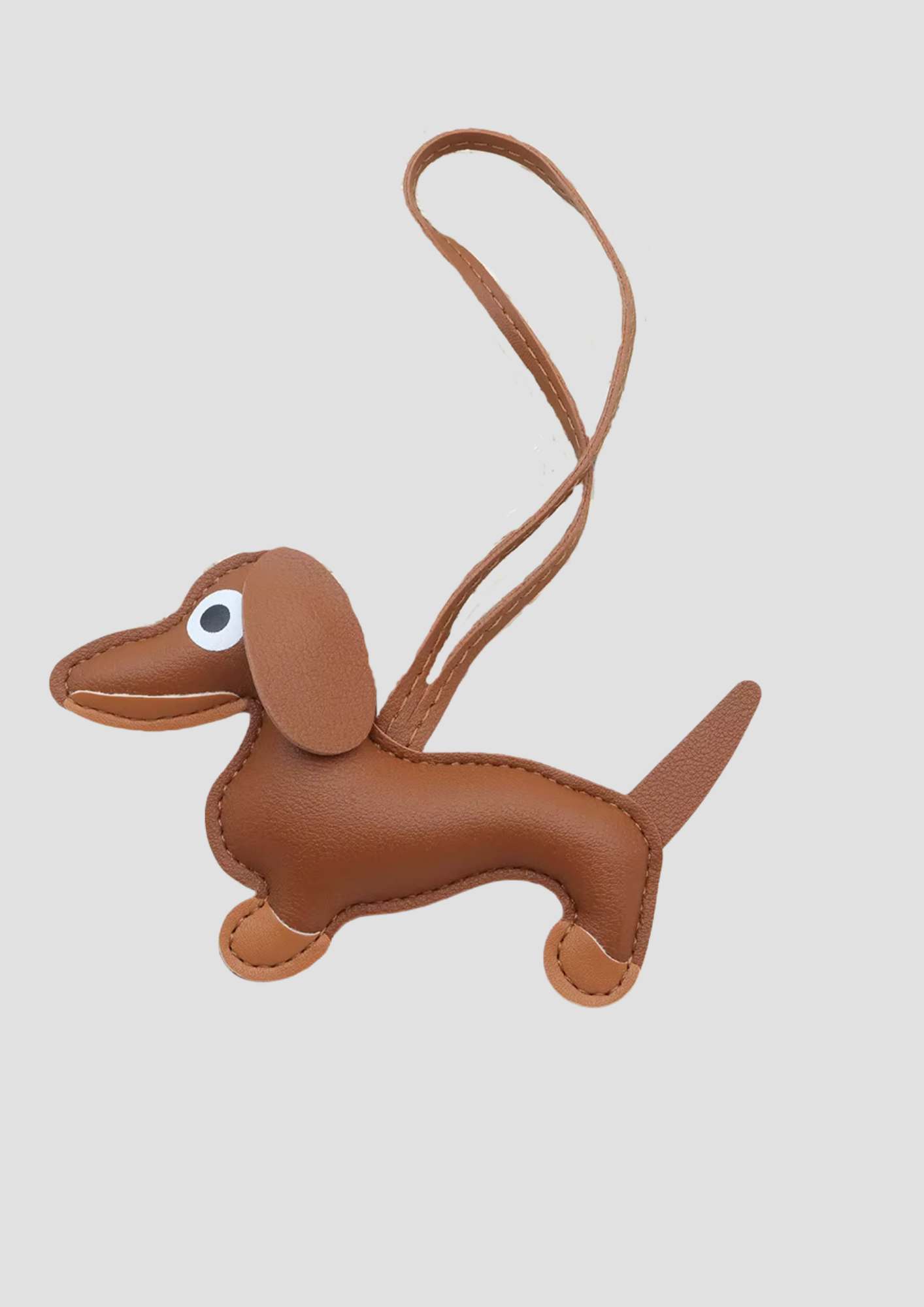 Dachs with Strap bag charm – brown dachshund with cognac-colored strap from Ronja Studio